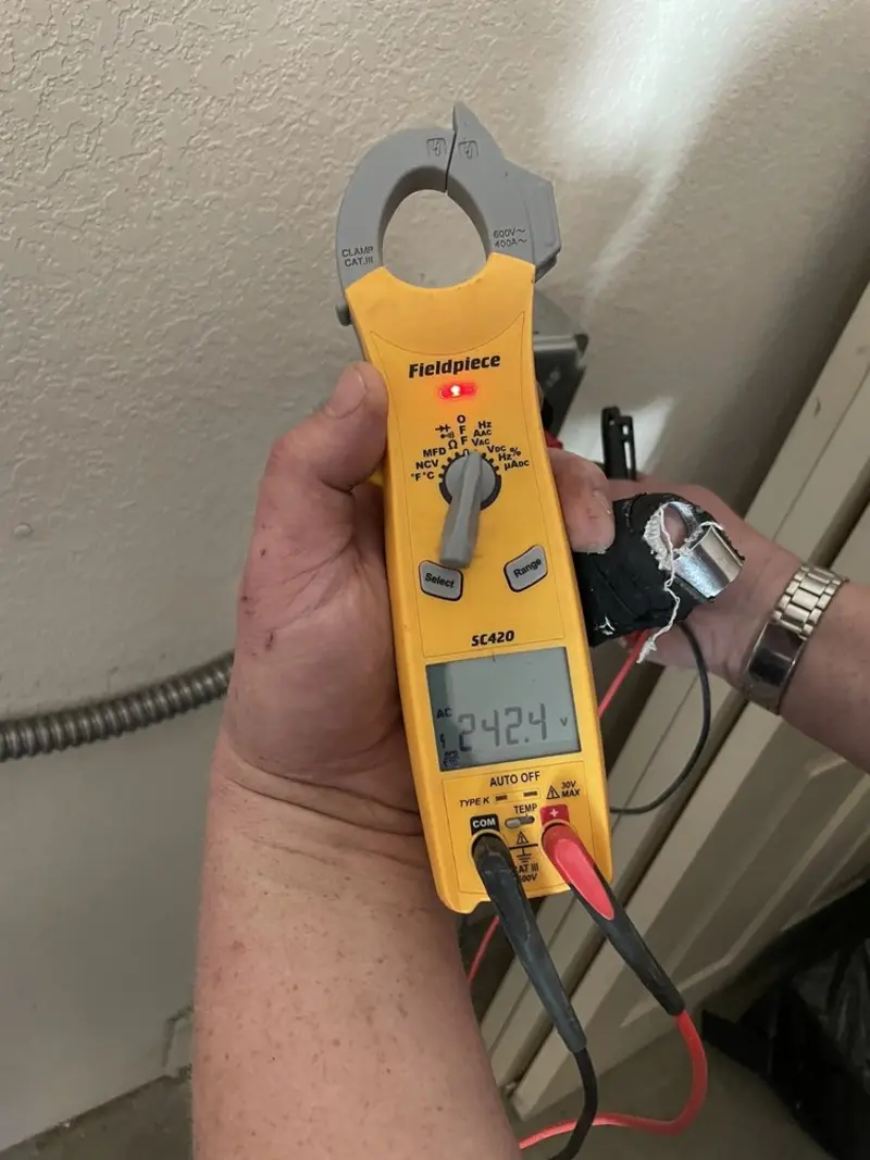 Voltage testing with clamp meter during Generator Installation in Millville